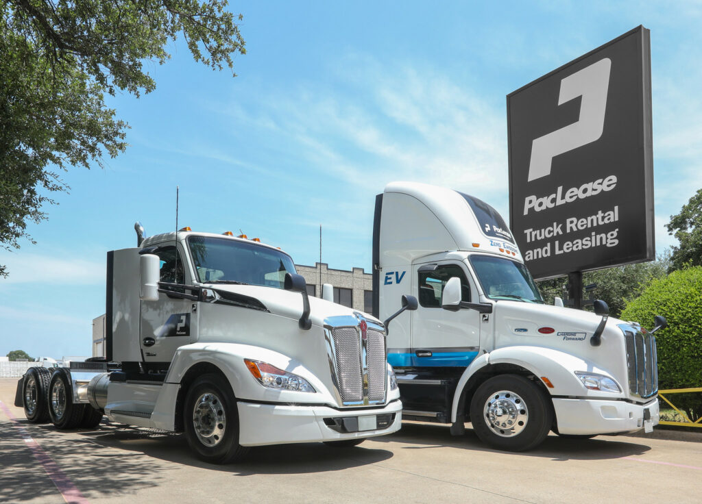 Trucks in front of PacLease sign