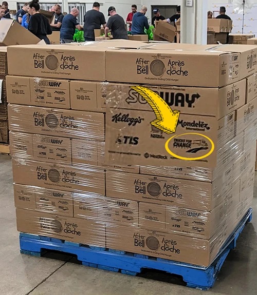 Picture of a Trucks for Change food pallet in a warehouse